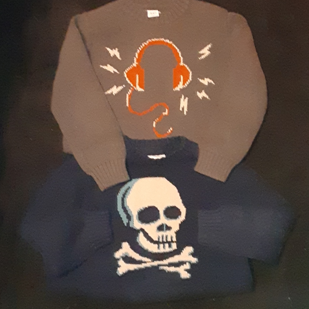2 Circo sweaters sz6/7  1 Skull & 1 w/ headphones